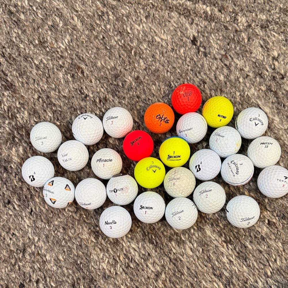 28 Used Golf Balls